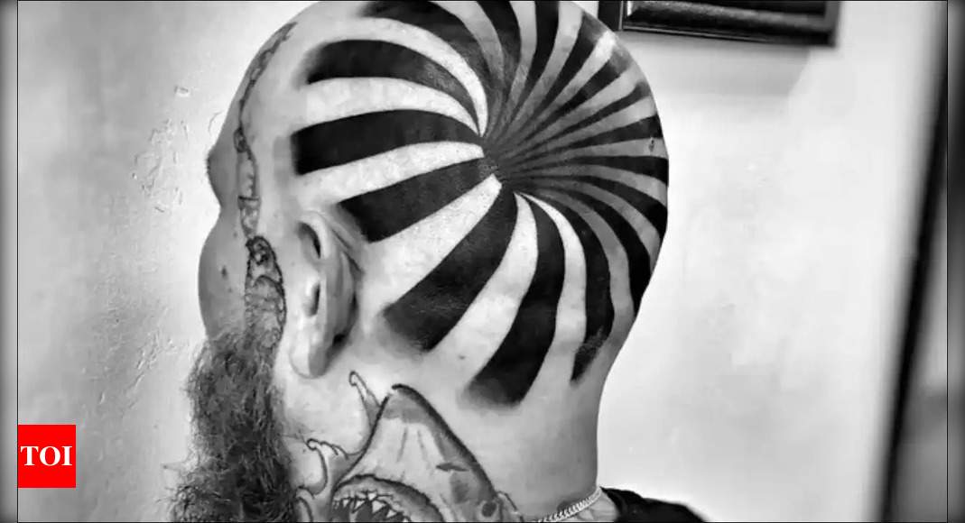 Optical illusion: Man's tattoo looks like he has a hole in his head